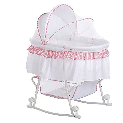 Pink and 2024 white bassinet