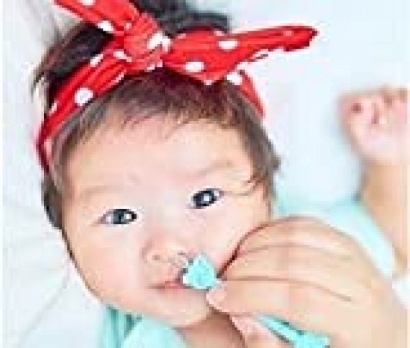 The Oogiebear helps parents pick their babies noses safely