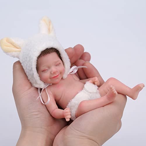 Tiny lifelike baby sales dolls