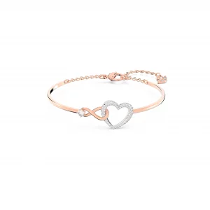 Swarovski Hyperbola Womens Bangle Bracelet with a Rose-Gold Tone Plated Bangle, Clear Crystals and Lobster Clasp